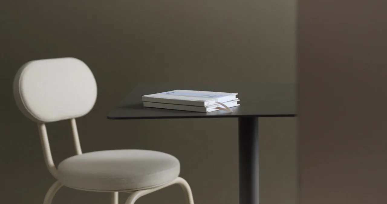 White seat with a table and books, by cottonbro studio, on Pexels